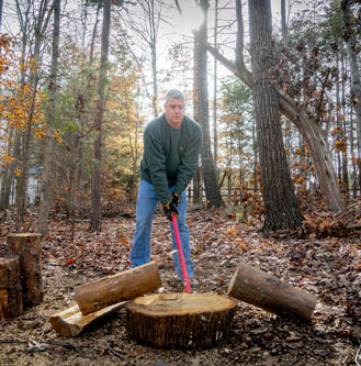 Patient Garrett Constanzo chopping wood 